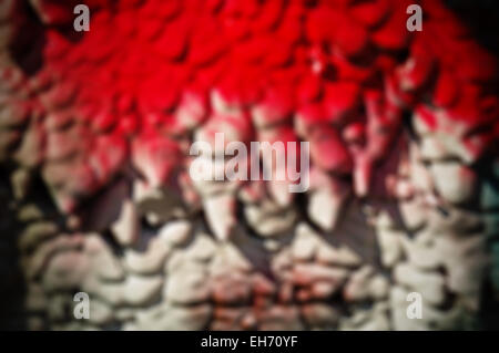 red and white spraypaint blur background with vignette Stock Photo