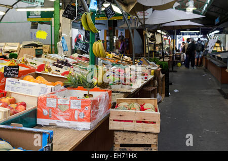 A fruit vendor's stall at the Marché des Enfants Rouges, an organic marketplace on the Rue de Bretagne, Marais, Paris, France Stock Photo