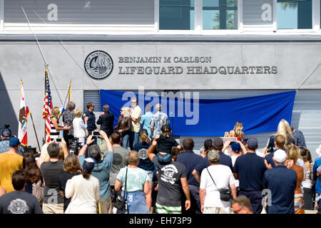 Newport Beach, California, USA. 8th March, 2015. Lifeguards, family, friends, civic leaders, and community members turned up in droves to the re-dedication of the Newport Beach, CA Lifeguards Headquarters Building, now called the Benjamin M. Carlson Lifeguard Headquarters in honor of lifeguard Ben Carlson, who gave his life saving a swimmer the previous summer. Credit:  Benjamin Ginsberg/Alamy Live News Stock Photo