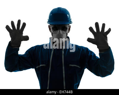 one  man construction protective workwear silhouette portrait in studio on white background Stock Photo