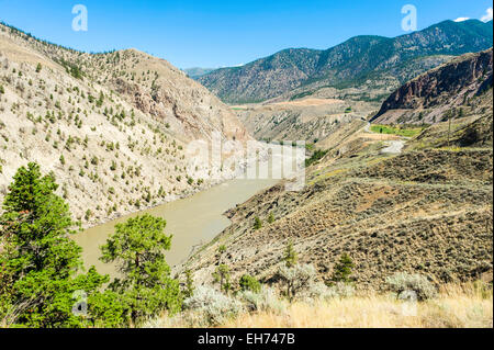 View Northeast to a bend in the Fraser River, with Highway 99 to right, near Fountain Valley, Lillooet, BC, Canada. Stock Photo