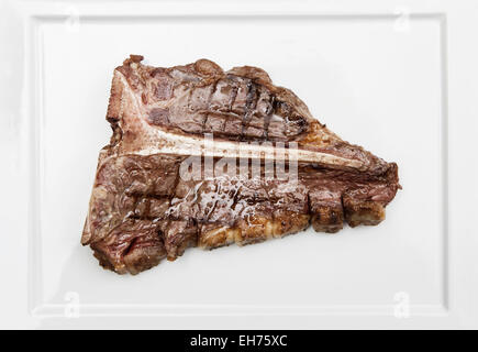 Delicious and juicy T-bone steak on a plate Stock Photo