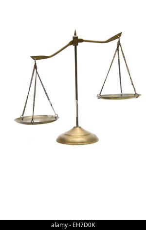 unbalance of golden brass scales of justice on white Stock Photo