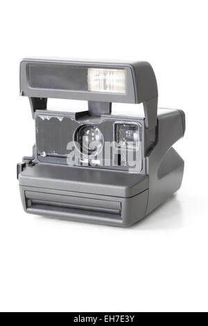 Vintage instant photo camera on white background Stock Photo