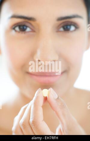 Woman holding tablet Stock Photo