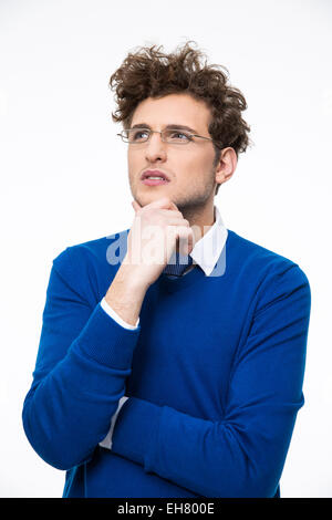 Portrait of a thoughtful young businessman in glasses Stock Photo