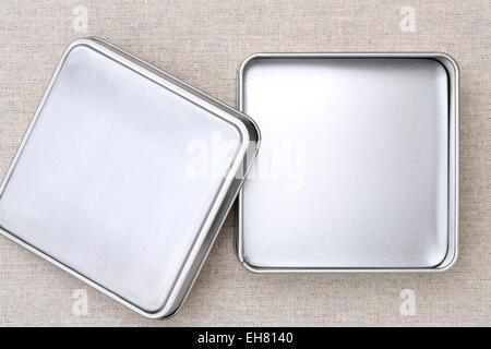 Empty metal box on burlap background Stock Photo