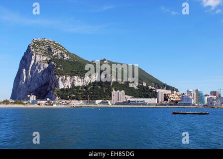 The rock and town seen across the bay from Spain, Gibraltar, United Kingdom, Western Europe. Stock Photo