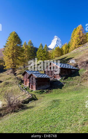 The Matterhorn seen from a little group of mountain huts by Zermatt, Swiss Canton of Valais, Swiss Alps, Switzerland Stock Photo
