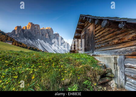 The sunrise over the Odle group from Malga Gampen in the Dolomites, South Tyrol, Italy, Europe Stock Photo