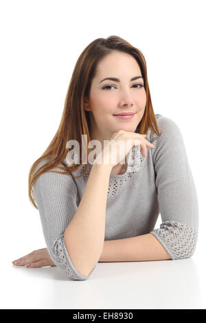 Portrait of a beautiful relaxed woman looking at camera isolated on a white background Stock Photo