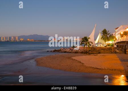 View over beach ast dusk, Downtown, Puerto Vallarta, Jalisco, Mexico, North America Stock Photo