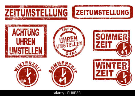 Set of red grunge style ink stamps showing german terms for daylight saving time Stock Photo