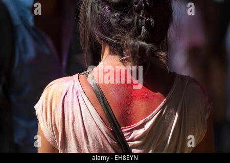 Dhaka, Bangladesh, 08 March 2015.Bangladeshi youth playing coloured powders during Holi celebrations at the Fine Arts Institute of Dhaka University. The Holi festival is celebrated to mark the onset of spring, with people from all walks of life coming out on the streets and applying coloured powder to anyone and everyone upon the advent of spring. Holi is the festival of colors, fun and frolic and is celebrated by millions of Hindus in the Indian subcontinent to welcome the spring. An ancient Hindu festival, Holi is marked as a triumph of good over evil, and has become popular among non-Hindu  Stock Photo