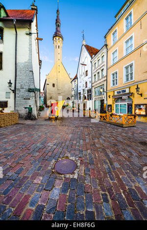 Old shops and pubs line the way to the Town Hall of Tallinn. Stock Photo