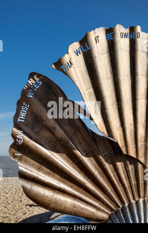 Scallop, a steel sculpture (2003) on the beach at Aldeburgh, Suffolk, UK, designed by Maggi Hambling and dedicated to the composer Benjamin Britten Stock Photo