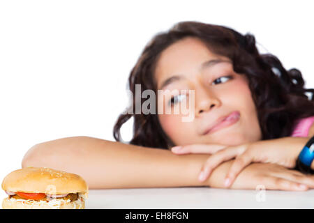 1 indian Young girl Teenager Delicious Burger Eating Temptation Stock Photo