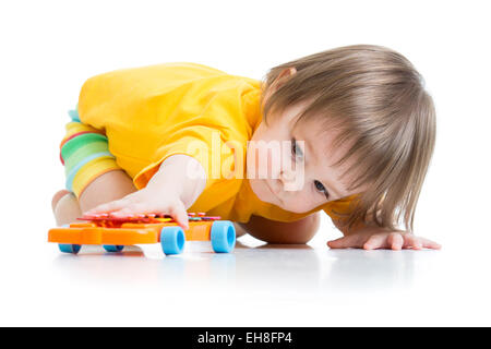 little boy toddler playing with toy Stock Photo