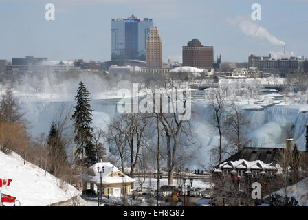 Niagara Falls almost completely frozen over in sub zero temperatures in February of Stock Photo