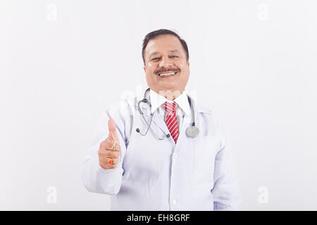 1 indian Senior Adult Man doctor Thumbs Up showing Stock Photo