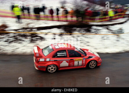 Tommi Makinen driving his Mitsubishi Lancer Evo VI on a stage of the 1999 Monte Carlo Rally Stock Photo