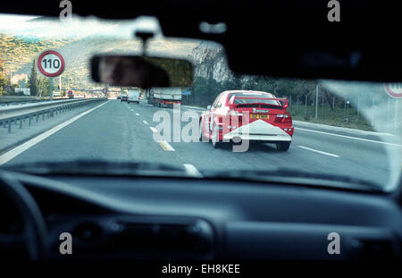 1999 Monte Carlo Rally. Tommi Makinen in Mitsubishi Lancia Evo VI on transport stage Stock Photo