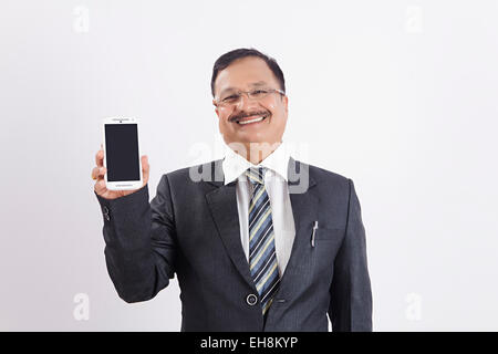 1 indian Business Man Mobile Phone showing Quality Stock Photo