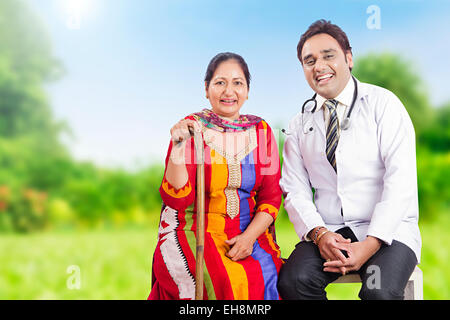 2 indian people Doctor Patient park Health Recovery Stock Photo