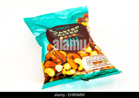 Mixed nuts packet roasted salted tesco make pack logo product cutout white background copy space isolated Stock Photo