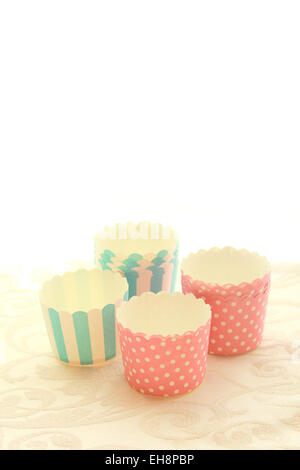 Empty round muffin cups, polka dots Stock Photo