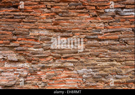 layers of handmade medieval clay red tiles used in wall of kitchen as heat resistant and wont crack like sandstone blocks Stock Photo