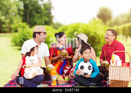 indian group crowds grand Parents park Picnic Stock Photo