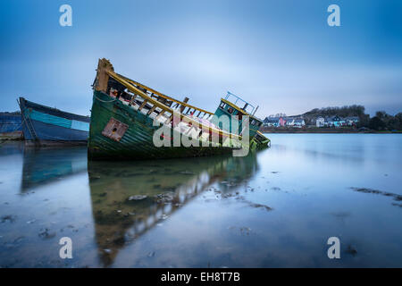 Old boats in their final resting place at Hooe Lake in Pylmouth, Devon Stock Photo