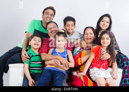 indian group crowds grand Parents Joint Family sitting Sofa Stock Photo