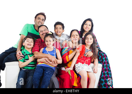 indian group crowds grand Parents Joint Family sitting Sofa Stock Photo