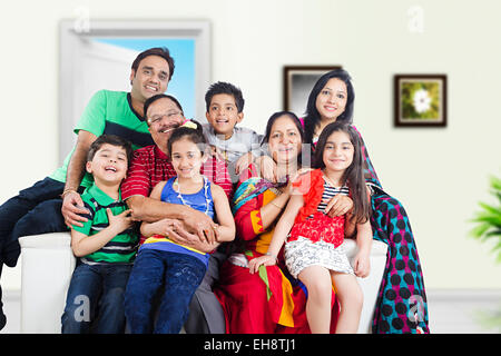 indian group crowds grand Parents Joint Family sitting Sofa Stock Photo