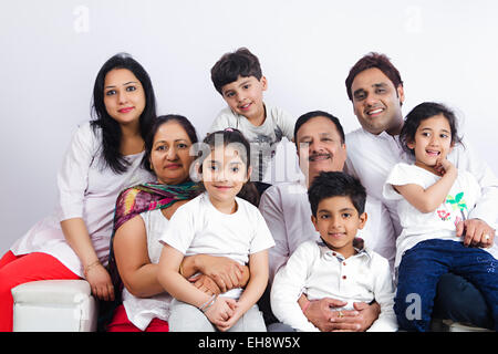 indian group crowds grand Parents Joint Family sitting Sofa Stock Photo