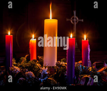 4 pink advent candles in religious cristian traditional wreath