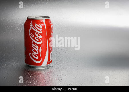 SABAH, MALAYSIA - March 08, 2015: Classic Coca-Cola Can on metal background. Stock Photo