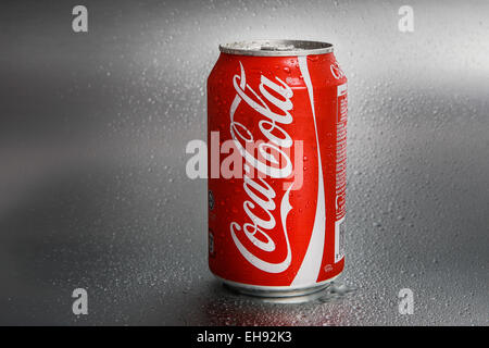 SABAH, MALAYSIA - March 08, 2015: Classic Coca-Cola Can on metal background. Stock Photo