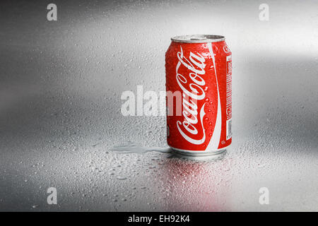 SABAH, MALAYSIA - March 08, 2015: Classic Coca-Cola Can on metal background. Stock Photo