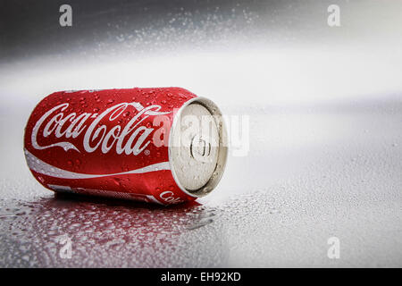 SABAH, MALAYSIA - March 08, 2015: Classic Coca-Cola Can on metal background. Stock Photo