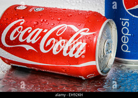 SABAH, MALAYSIA - March 08, 2015: Coca-Cola and Pepsi cans on metal background. Stock Photo