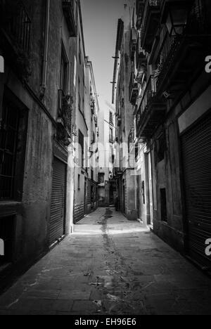 Dark sunshine narrow lane way in Barcelona. Stock Photo