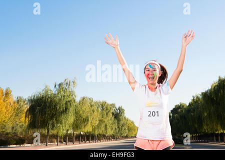 Young woman at The Color Run Stock Photo
