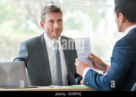 Businessmen in meeting Stock Photo