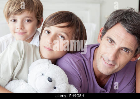 Father with young boys, portrait Stock Photo