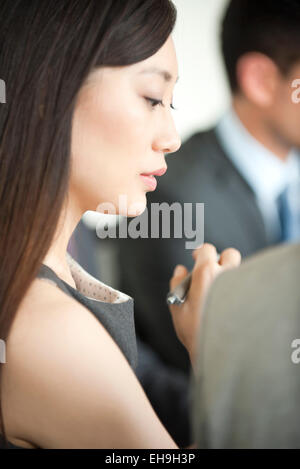 Businesswoman at meeting Stock Photo