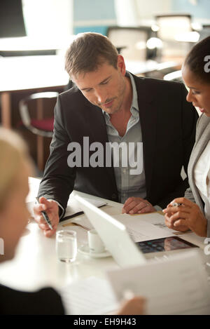Colleagues working together Stock Photo