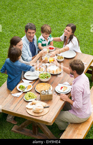 Family and friends gather for picnic Stock Photo